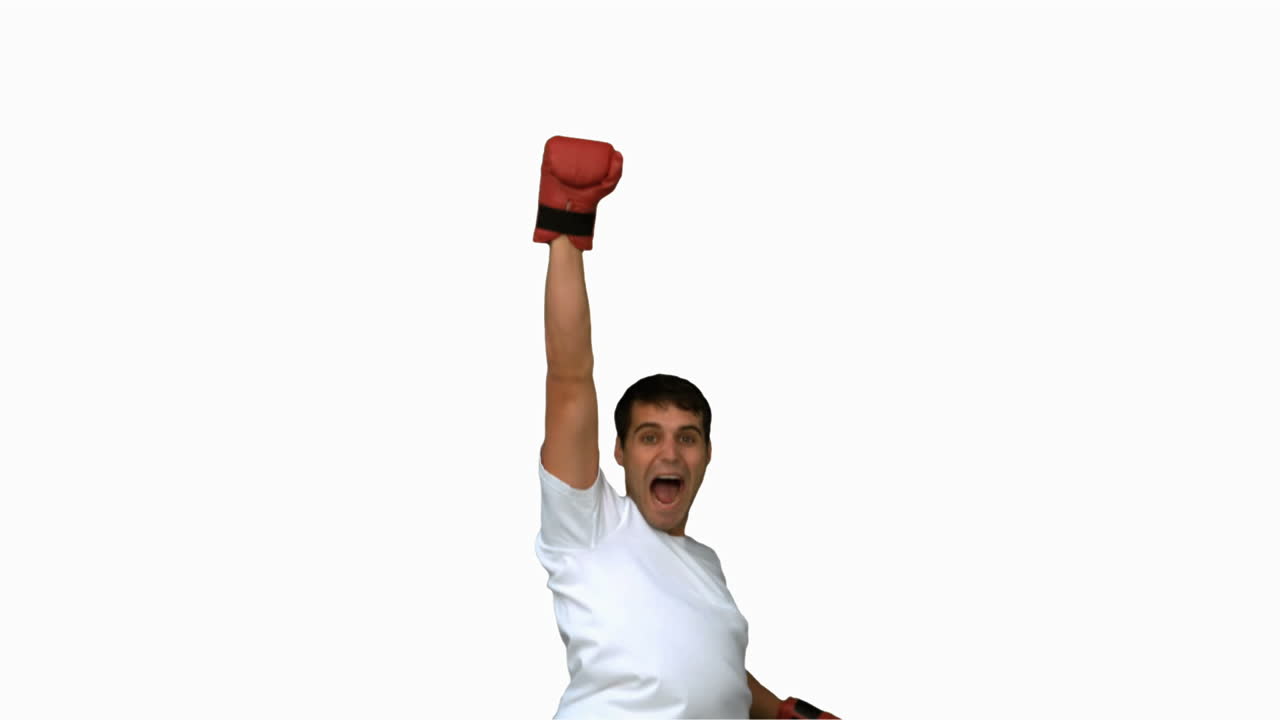 Man wearing boxing gloves on white screen