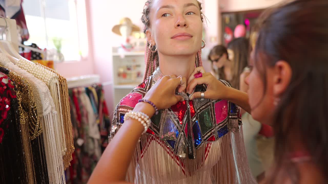 Woman in a Sequin Dress at a Boutique