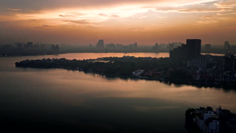 west lake or ho tay, hanoi cityscape at sunset, vietnam