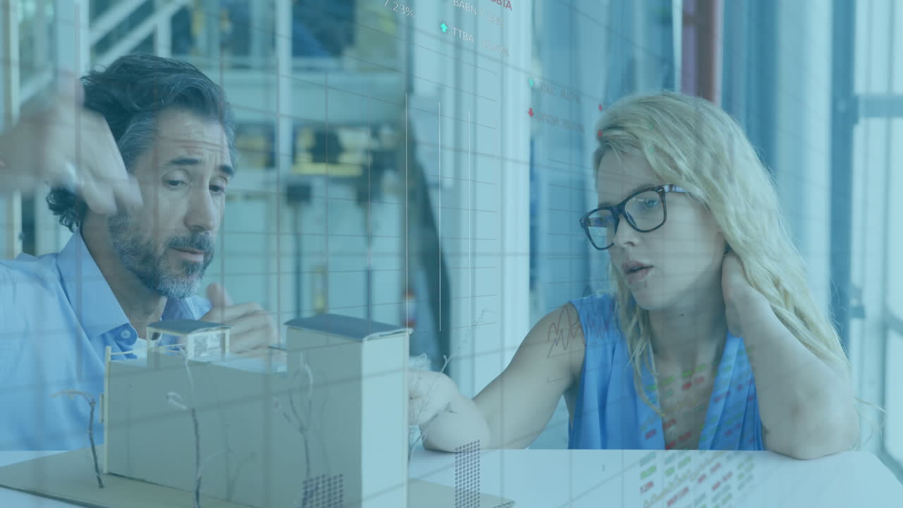 Animation of financial data processing over diverse business people in office