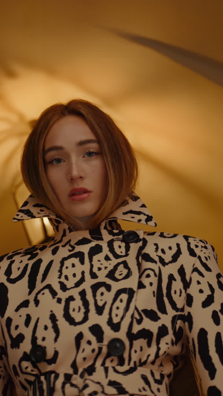 Stylish Woman in Leopard Print Coat