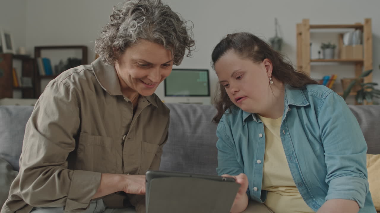 People using a tablet together
