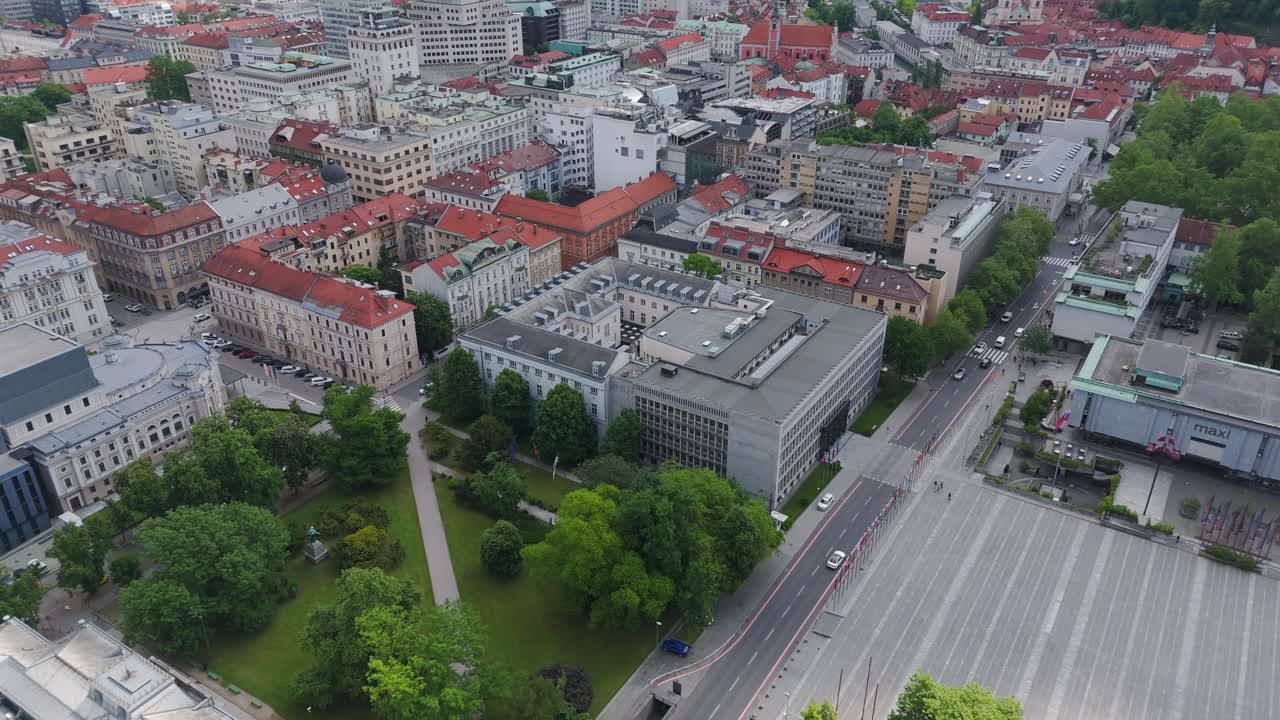 Aerial: Slovenia’s national parliament during the day in Ljubljana, Slovenia, orbit drone shot