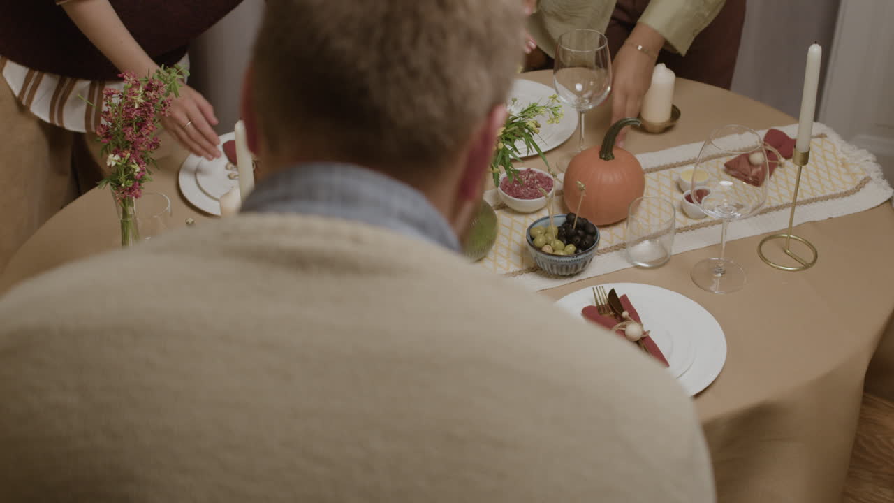 Festive Holiday Dinner Party Table Setting with Friends