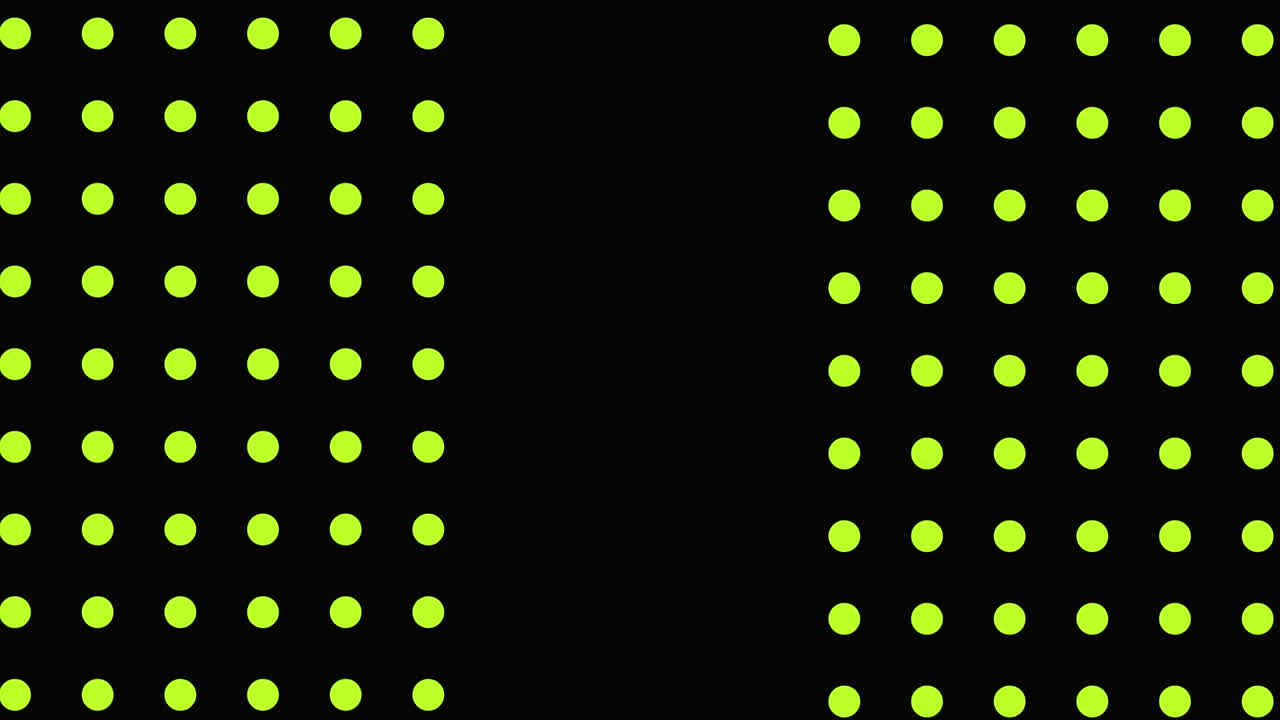 Green and yellow triangles and white flashes moving on a black background with yellow dots