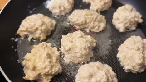 fried chicken meatballs in a pan