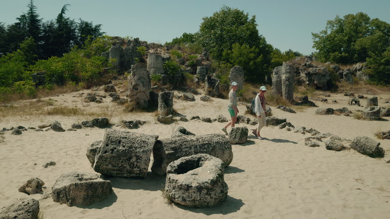 Tourists Exploring a Stone Forest