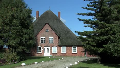 Traditional-north-German-house-with-thatched-rooves-near-town-of-Husum,-Germany-2