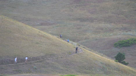 Biker-riding-in-the-mountains-of-Colorado