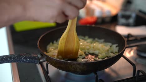 cooking onions in a pan