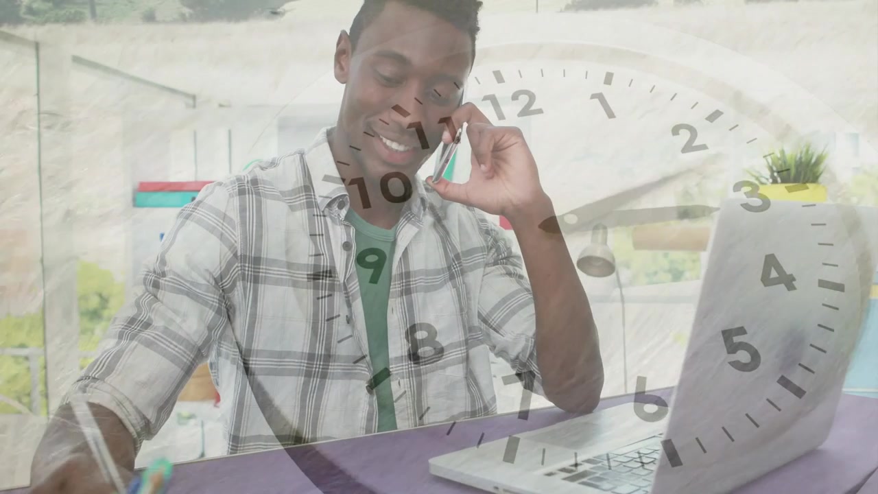 Remote worker receiving phone call taking notes at laptop for work, clock overlay showing time