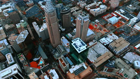 a view of downtown medellín from the cockpit of a helicopter. centro (the downtown area) is where the famous buildings of the city are and where lots of locals go daily to work and make a living