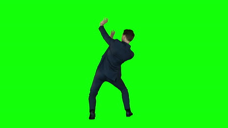 Businessman-protecting-himself--on-green-screen