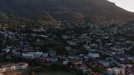 drone shot revealing table mountain in cape town, south africa