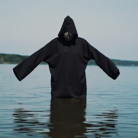 terrible witch on the river bank. mysticism of halloween