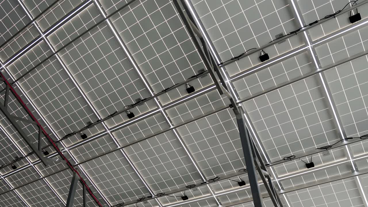 back side of solar panel. aluminum construction with electric wires