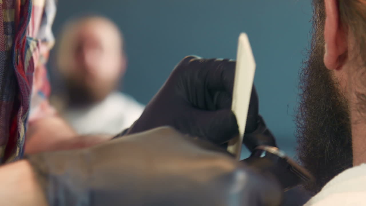 Barber Trimming a Beard