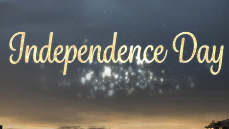 animation of independence day text with glowing lights and stormy sky