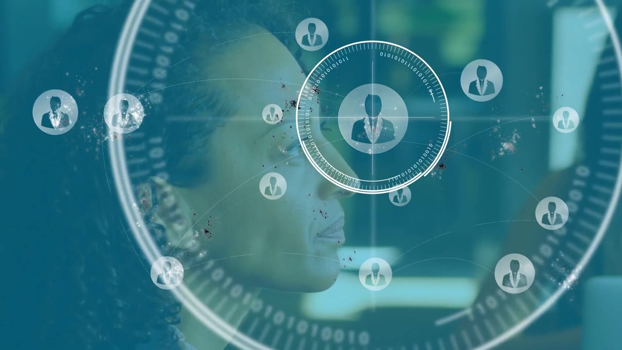 Woman focusing on monitor, activating HUD expanding rings, linking profiles, mapping tech network