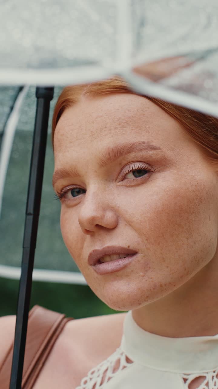Woman Under Umbrella in the Rain