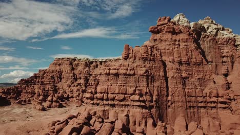 Goblin-Valley-State-Park-Utah-USA,-Drone-Aerial-View-of-Natural-Mushroom-Shaped-Sandstone-Rocks-and-Cliffs