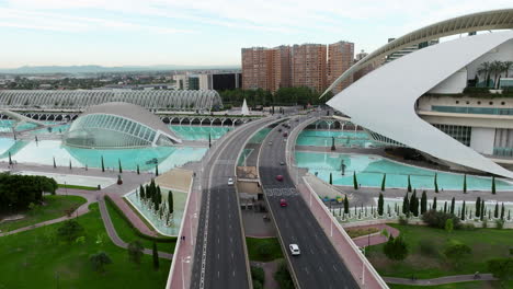 aerial view of roads and modern architecture in the city of arts and sciences in valencia, spain - drone shot