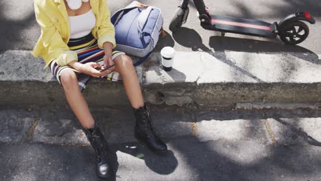 mixed race woman on the phone on the street