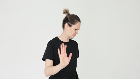 Woman showing stop or refusal gesture with disgust
