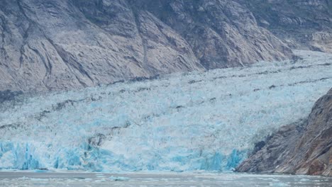 otherworldly view of the dawes glacier, endicott arm fjord, alaska.