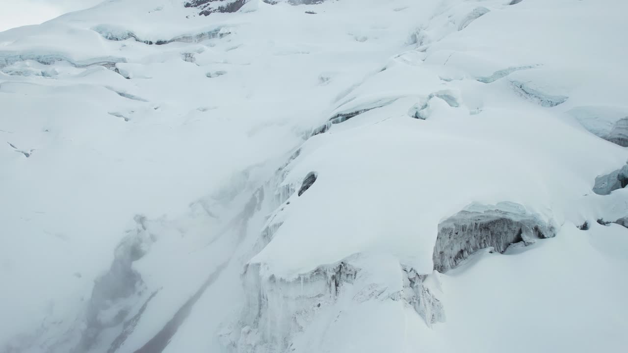 Drone Aerial View of Glacier, Frozen Ice and Snow in Mountains on High Elevation Cotopaxi Volcano, Ecuador, Drone Shot