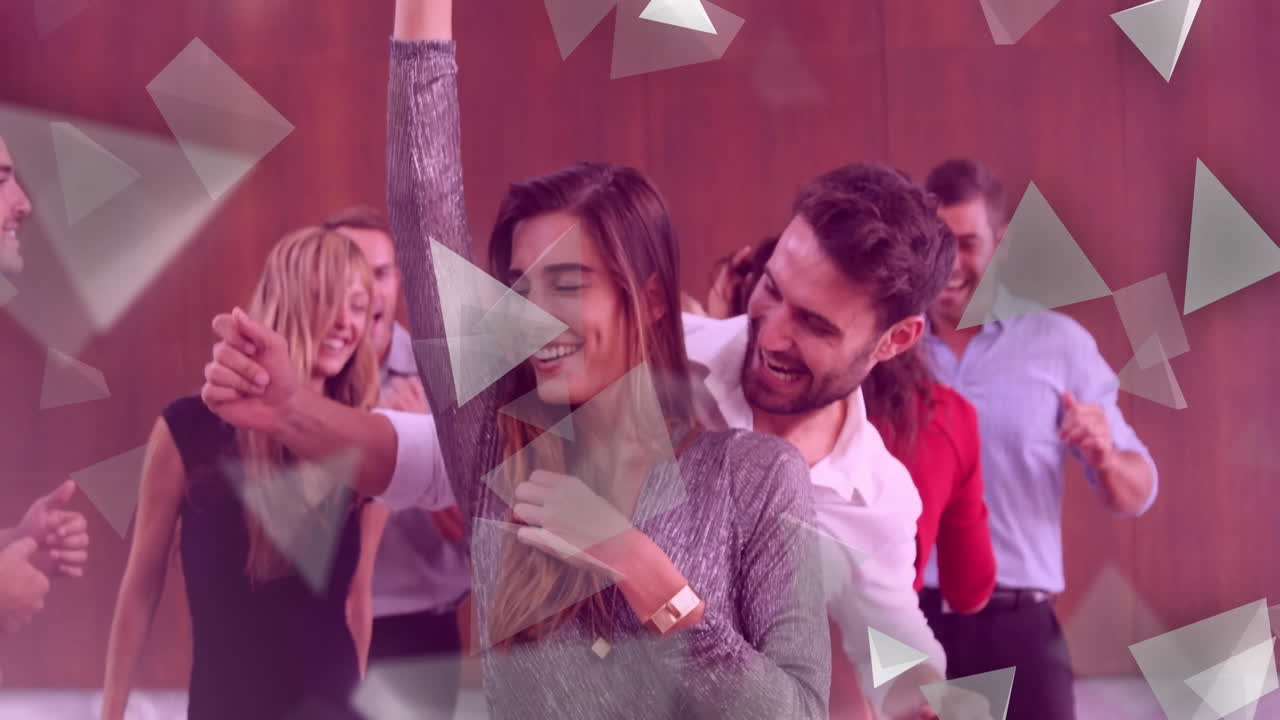 People dancing joyfully at party with geometric shapes animation overlay