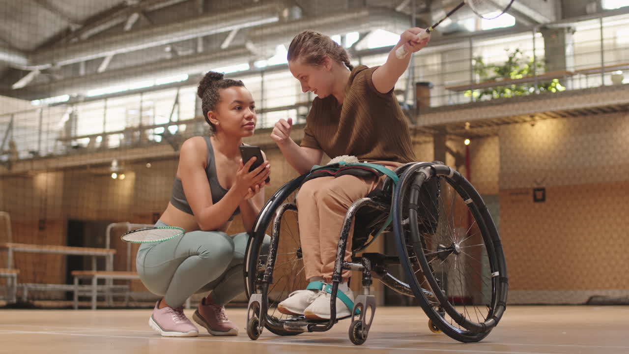 Diverse Badminton Players Talking on Court