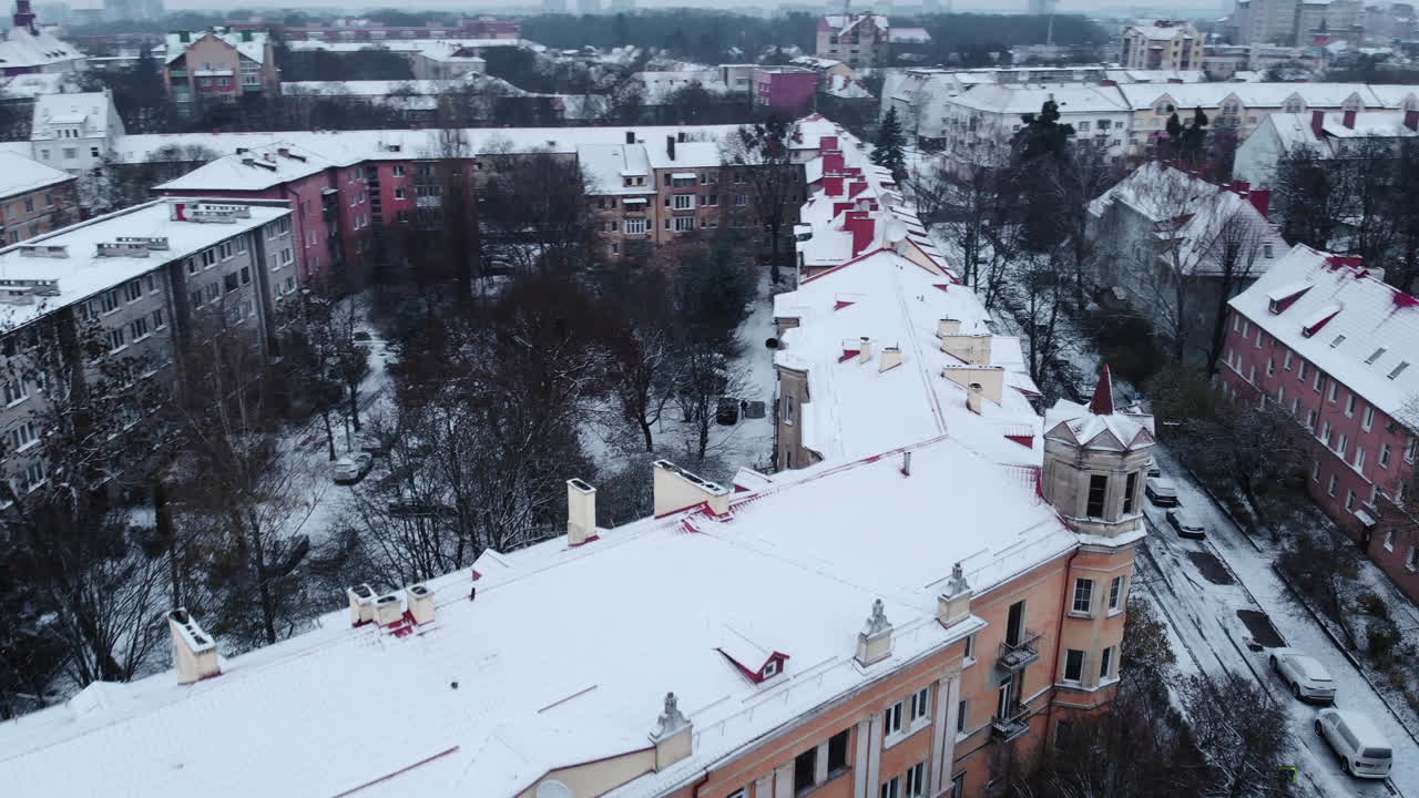 Winter Cityscape with Snow-Covered Buildings