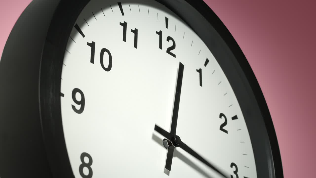 Clock Face on Rosy Rose Pink Wall in Time Lapse