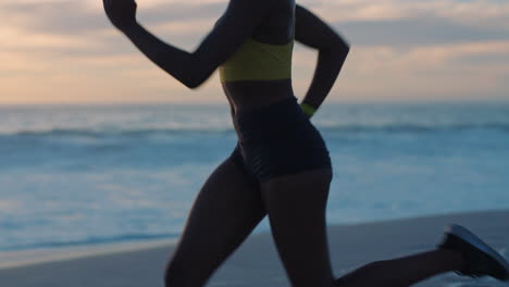 active, healthy and fit woman running on a beach