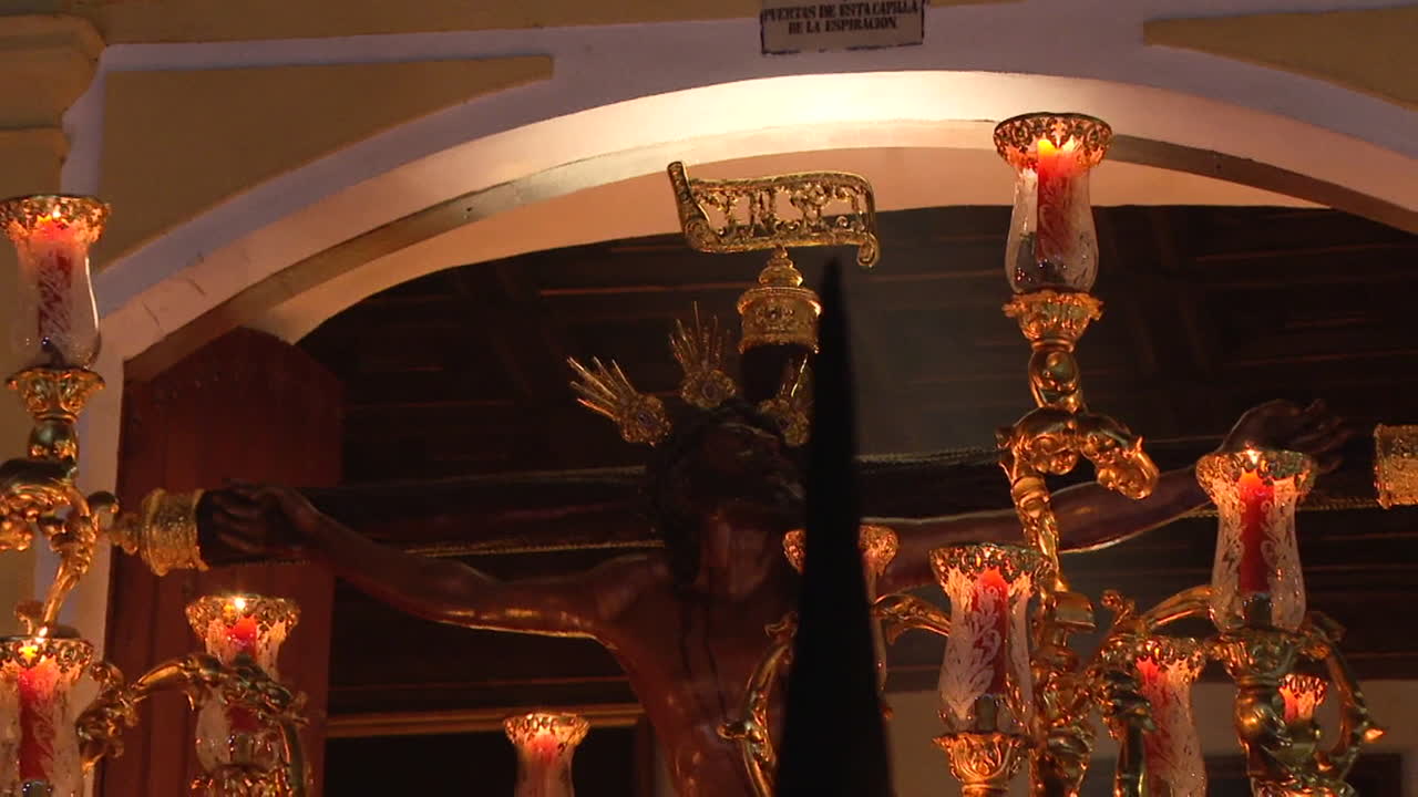 Religious Crucifixion Display with Candles