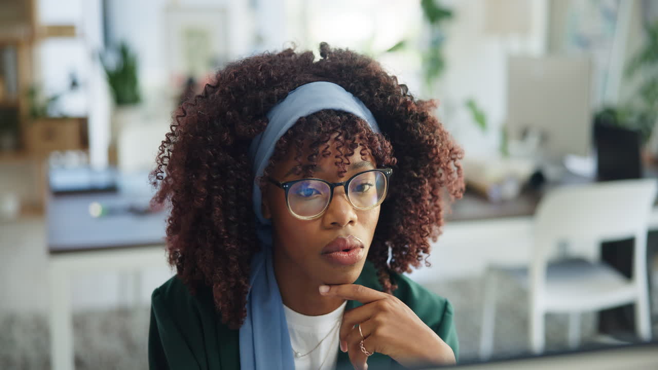 Focused Young Black Woman Working on Computer in Office