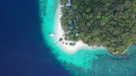 discover the hidden gem of banana island in palawan, philippines, as captured in this mesmerizing aerial footage