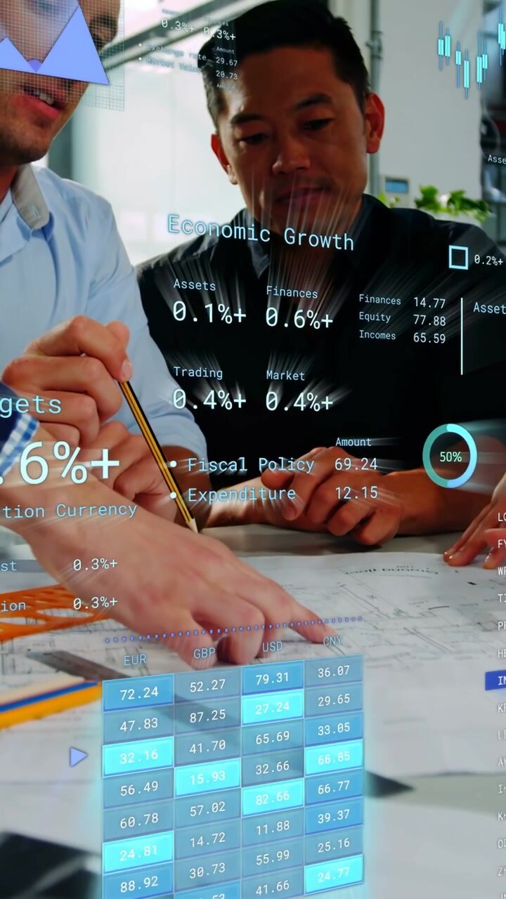 Vertical video: Team at table, left man pointing pencil starting finance review, AR grids updating
