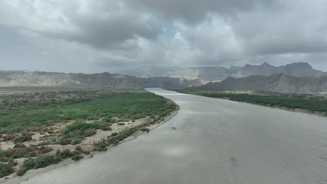 hingol river winding through balochistan, pakistan. aerial flyover