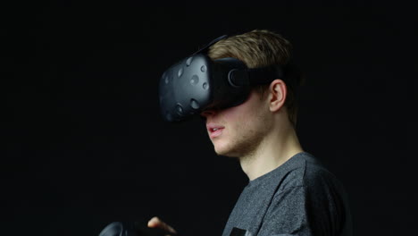 man wearing virtual reality headset in studio shot on r3d