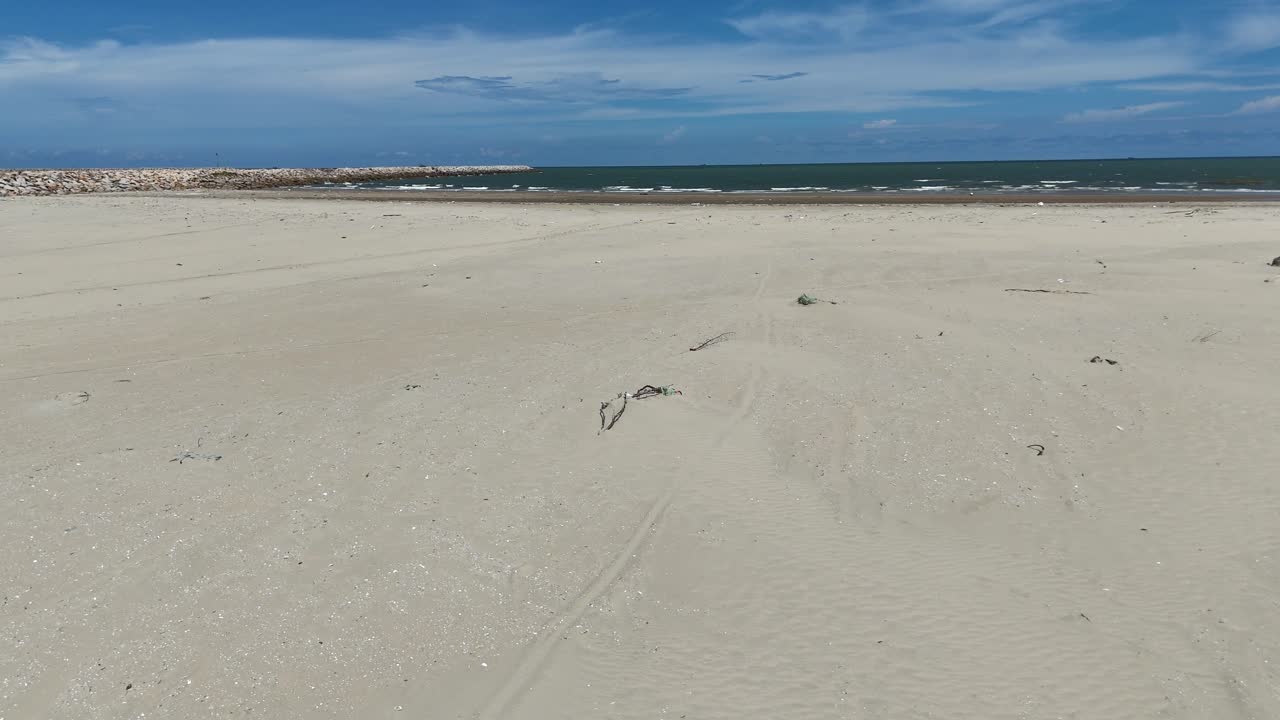 Aerial View Dolly of Walking on the Secret Beach in Vung Tau