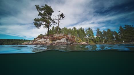 Split-level-view-over-and-underwater,-Otra-River,-Norway