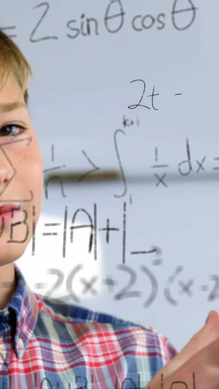 Animation of mathematical formulae over smiling schoolboy