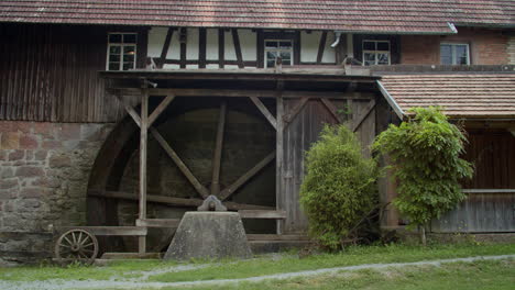 old watermill with wooden wheel