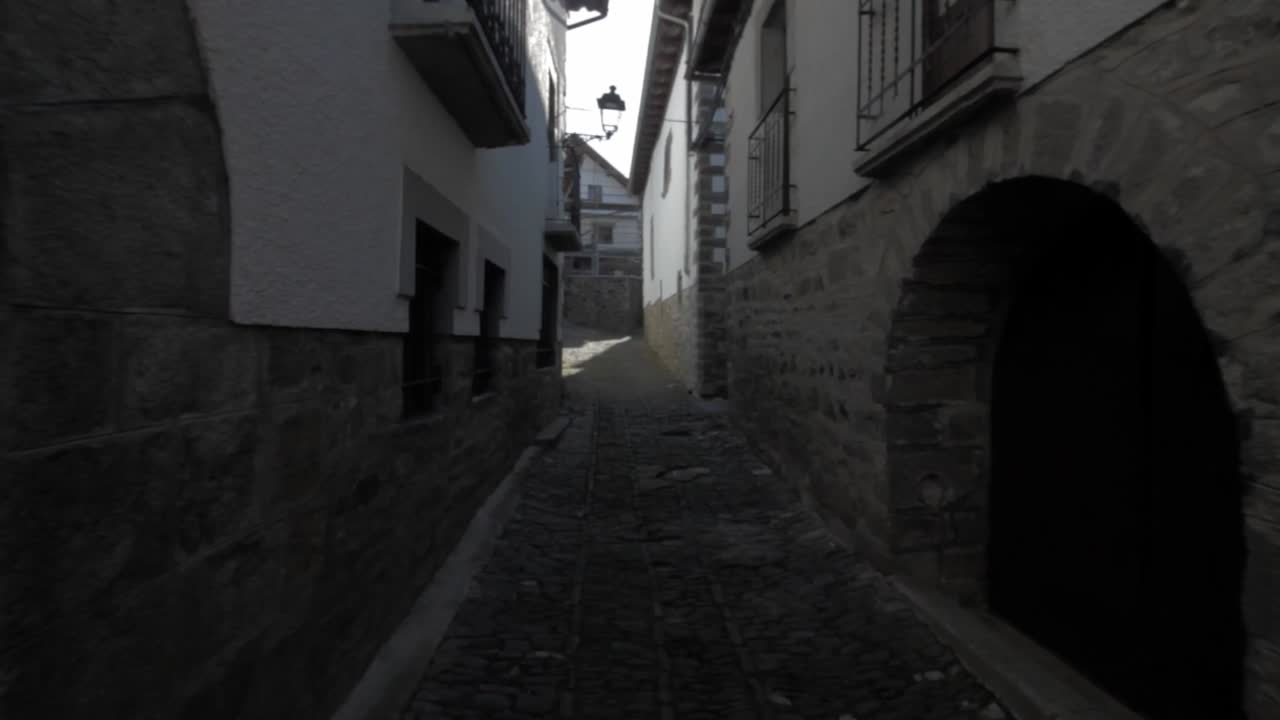 Travelling through ancient buildings in Otsagabia - Ochagavía , Navarra, Spain