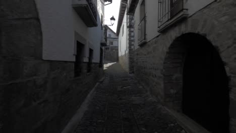 travelling through ancient buildings in otsagabia - ochagavía , navarra, spain