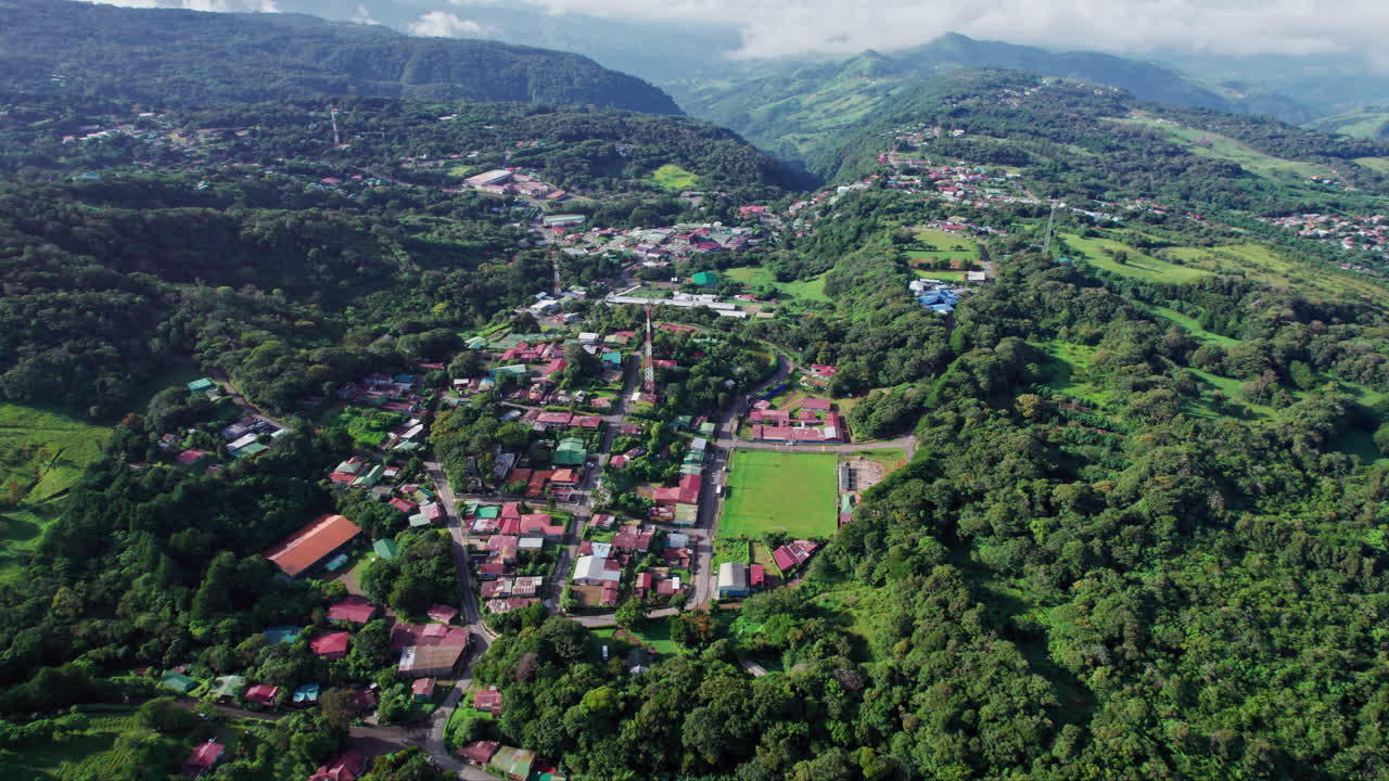 A circling aerial over the remote town of Santa Elena, near Monteverde Cloud Forest in the lush mountain region of central Costa Rica, a popular travel destination for ecotourism in Central America.