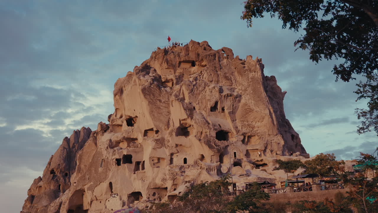Ancient Cave Dwellings in Cappadocia at Sunset