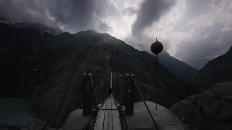 suspension bridge in the swiss alps